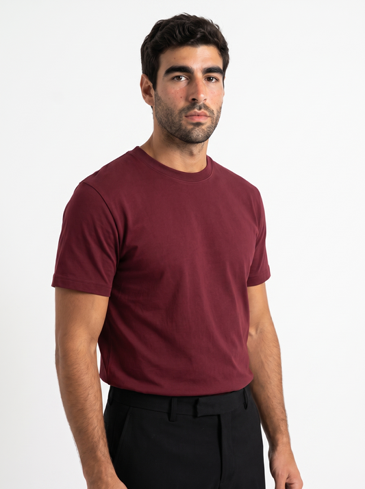 BLANC Unisex Basic Tee Burgundy worn by model on white studio background