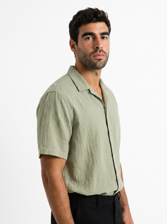 BLANC Linen Shirt Sage Green worn by model on white studio background